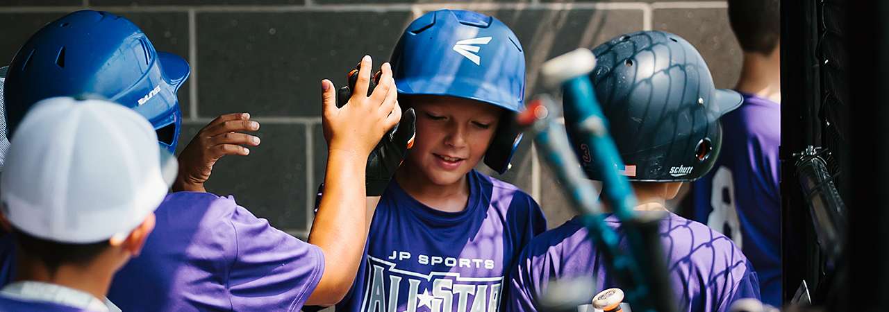 Youth boys baseball team in dugout