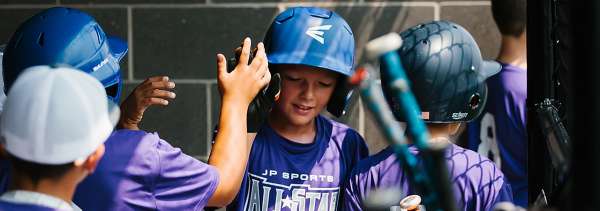 Youth boys baseball team in dugout